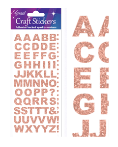 Rosa guld glimmer bogstaver på et klistermærkeark